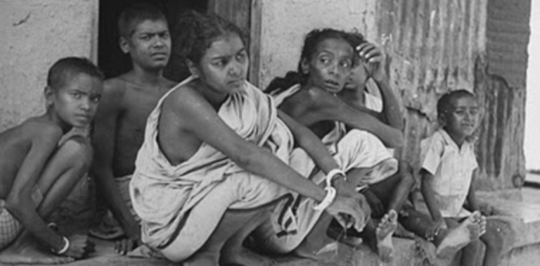A family living through the Bengal famine in 1943.